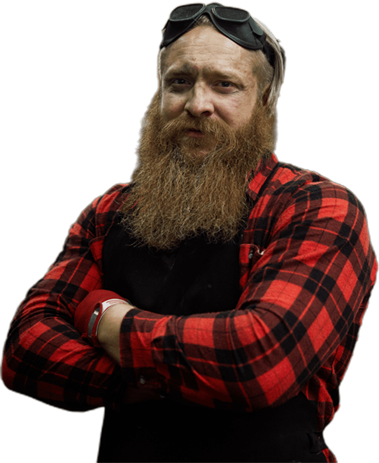 welder standing with arms crossed
